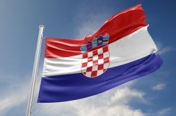 Croatia flag is waving at a beautiful and peaceful sky in day time while sun is shining. 3D Rendering
